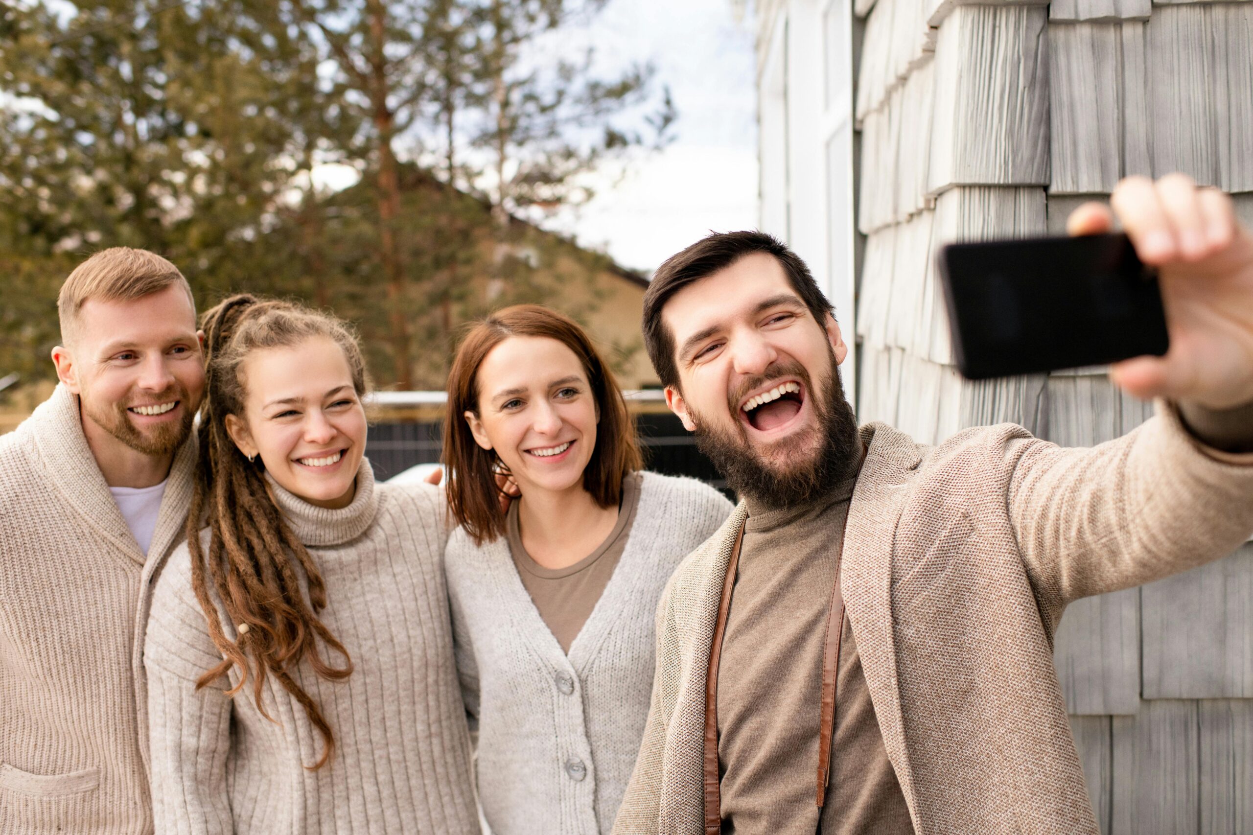 family smiling for a fall photo after visiting our dental office in Waldorf, MD